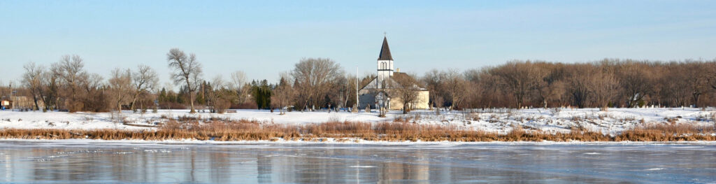 Church on the snow covered waterfront